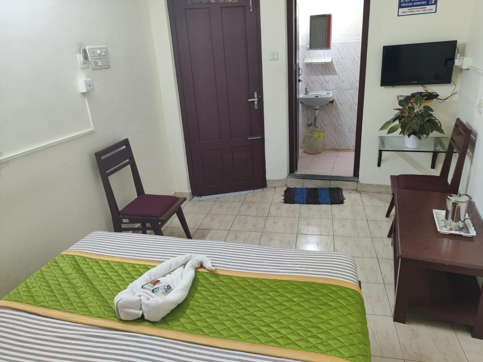 Hotel Gamas Inn Thiruvananthapuram Buitenkant foto